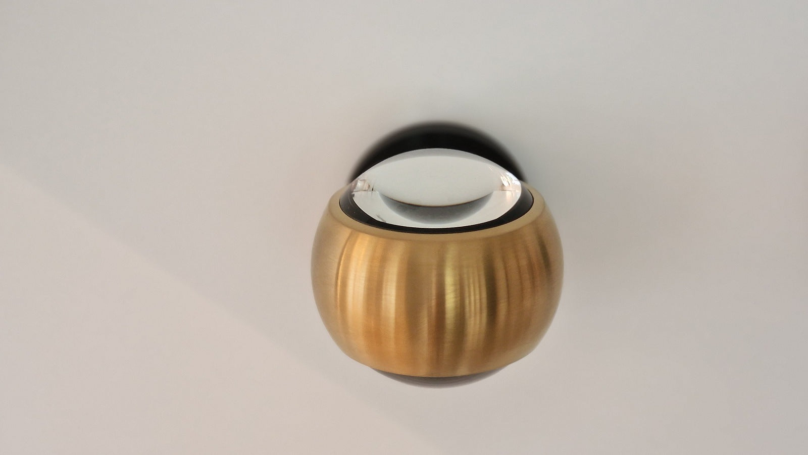 Occhio - Wandleuchte io verticale Kopf bronze Base schw. - Austellungsware